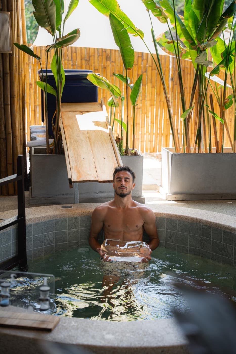 A guest in the iskall ice bath at Growth Club, Ao Nang